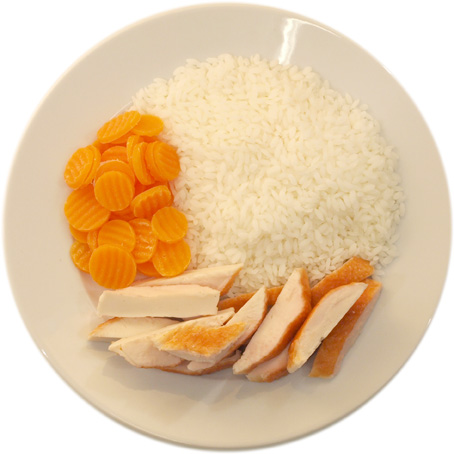 Chicken with a lot of rice and few carrots