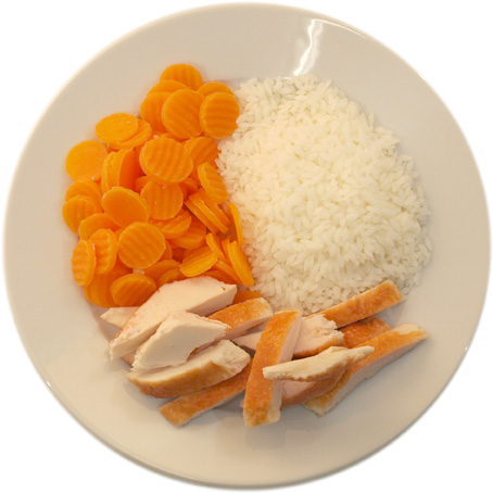 Chicken with a little less rice than carrots