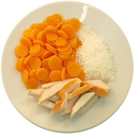 Chicken with very little rice and very many carrots