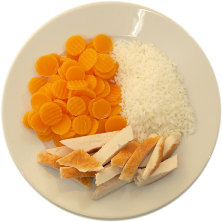 Chicken with little rice and many carrots