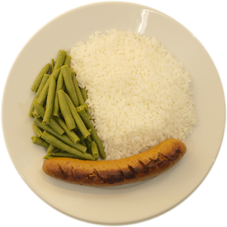 A sausage with a lot of rice and few beans