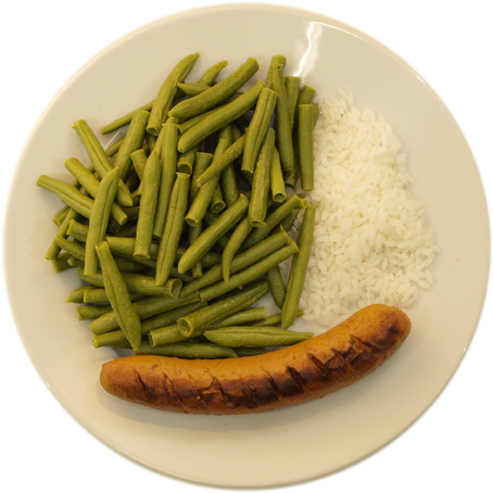 A sausage with very little rice and very many beans