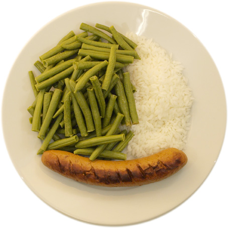 A sausage with little rice and many beans