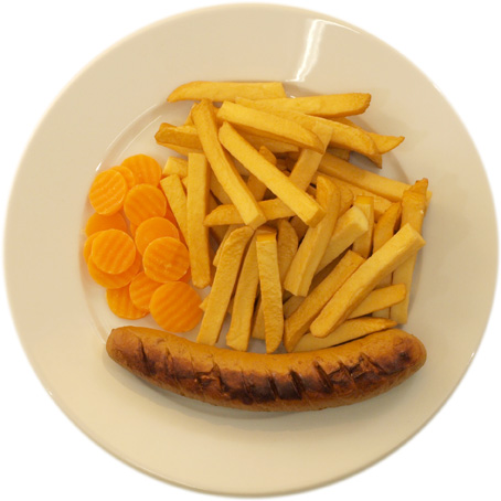 A sausage with very many French fries and very few carrots