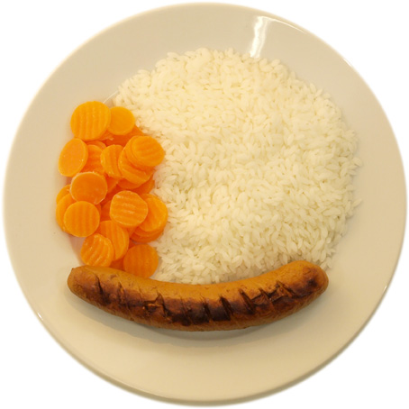 A sausage with a lot of rice and few carrots