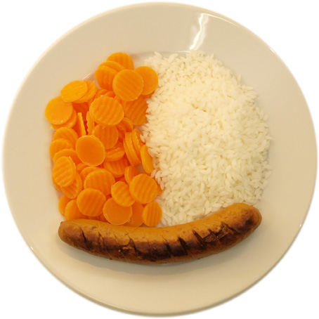 A sausage with a little less rice than carrots