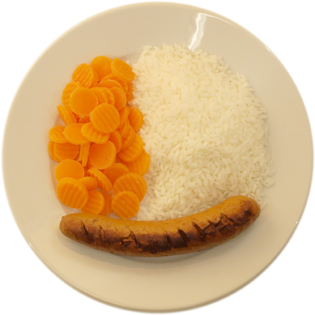 A sausage with a little more rice than carrots