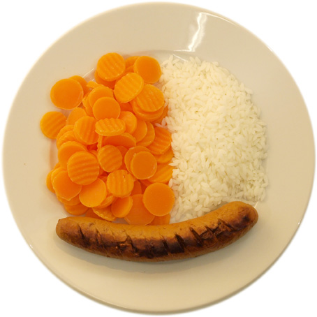 A sausage with little rice and many carrots